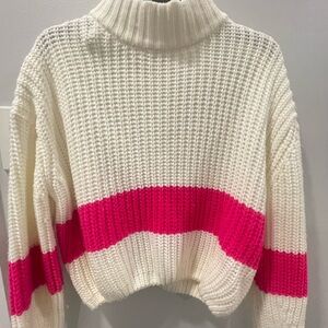 cream and hot pink color-block turtleneck sweater